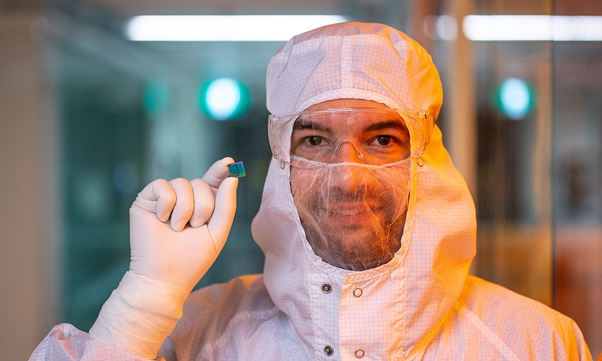 crispin-with-photonic-biosensor-chip.jpg