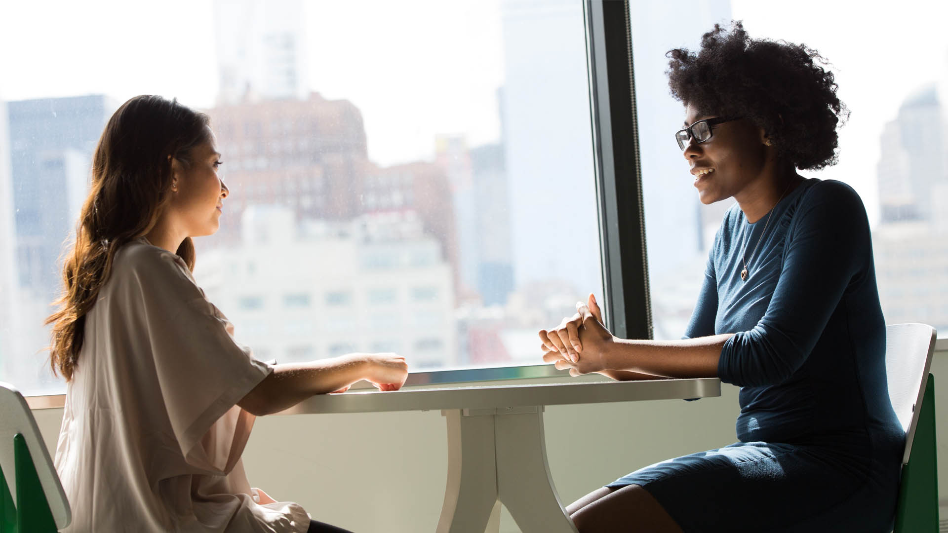 Students chatting at a table