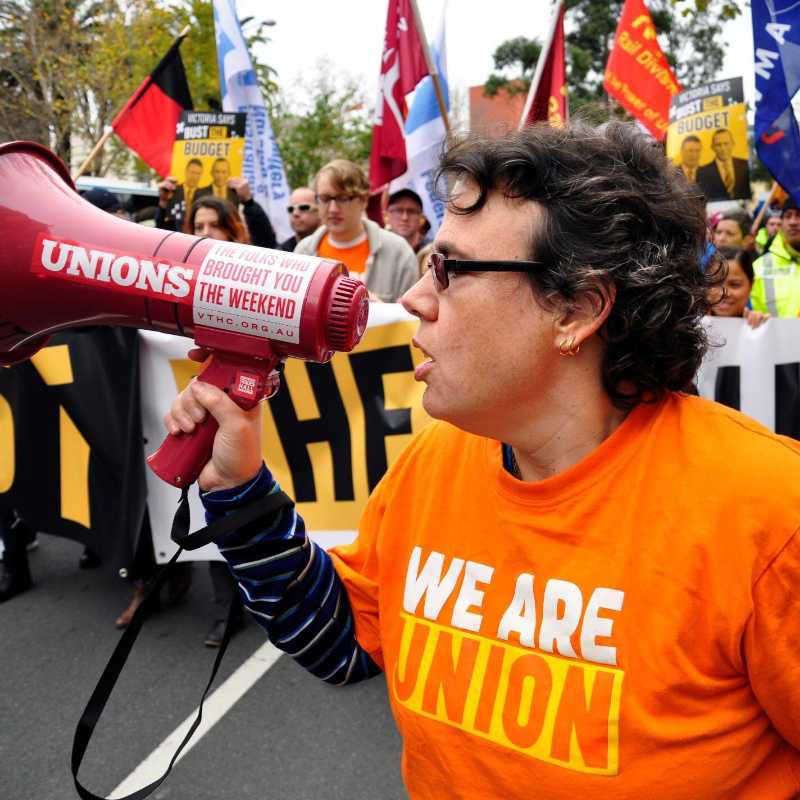 Person holding a Union megaphone at a protest