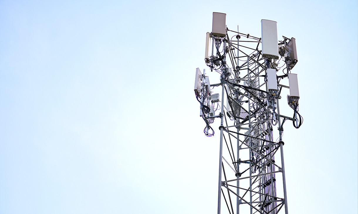 5G tower with blue sky in background