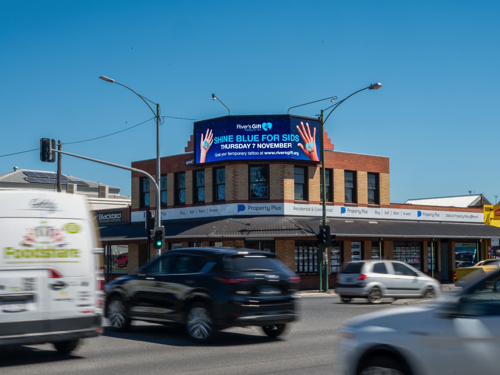 Billboard on corner of building