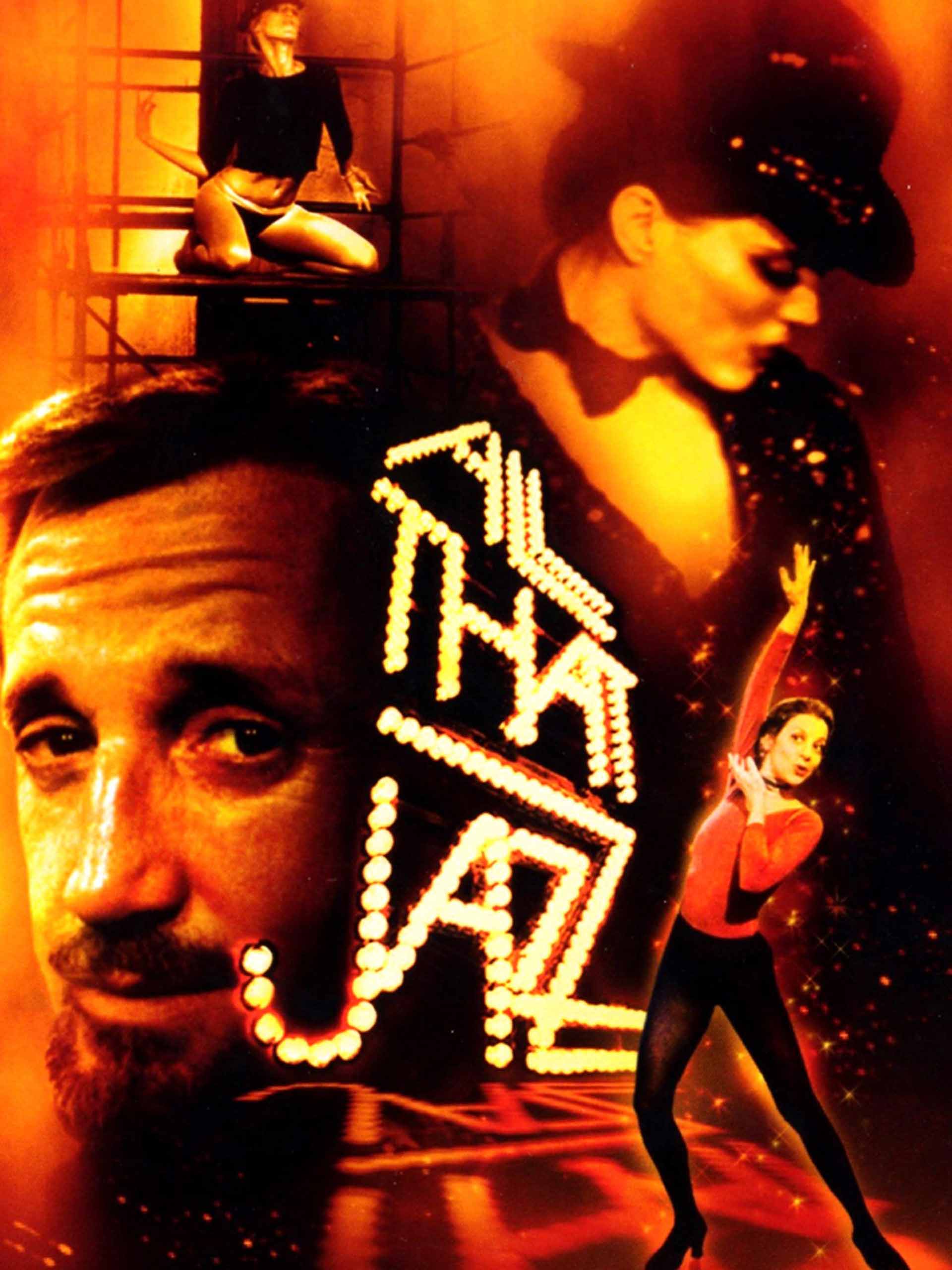 A lit-up sign saying 'All That Jazz' with a lady dancing next to it