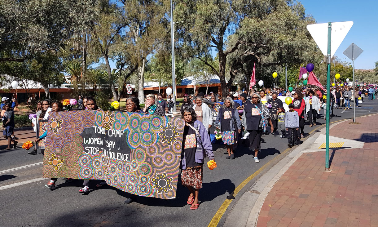 Master of Social Work student Simon Verity assisted a Women's March with the Tangentyere Council that raised awareness of domestic violence against Aboriginal women in town camps.