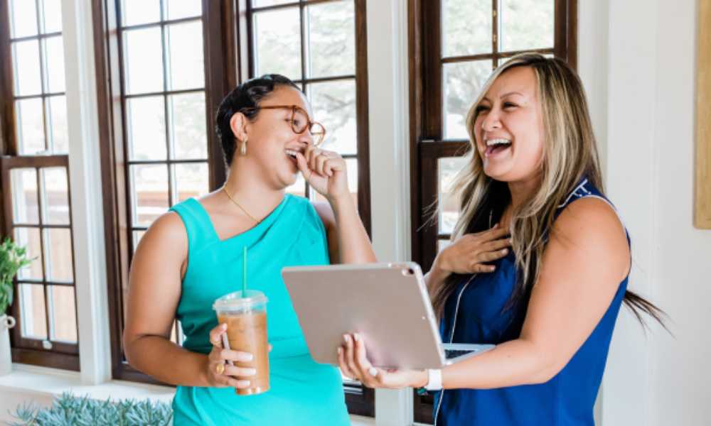 Two people laughing