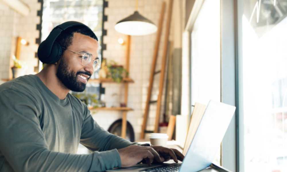 Person working at laptop at home