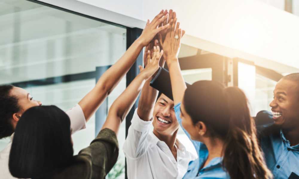 Group of people high fiving