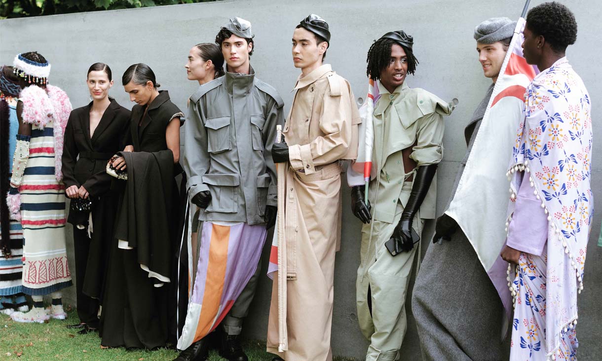 10 models wait in line at a fashion show