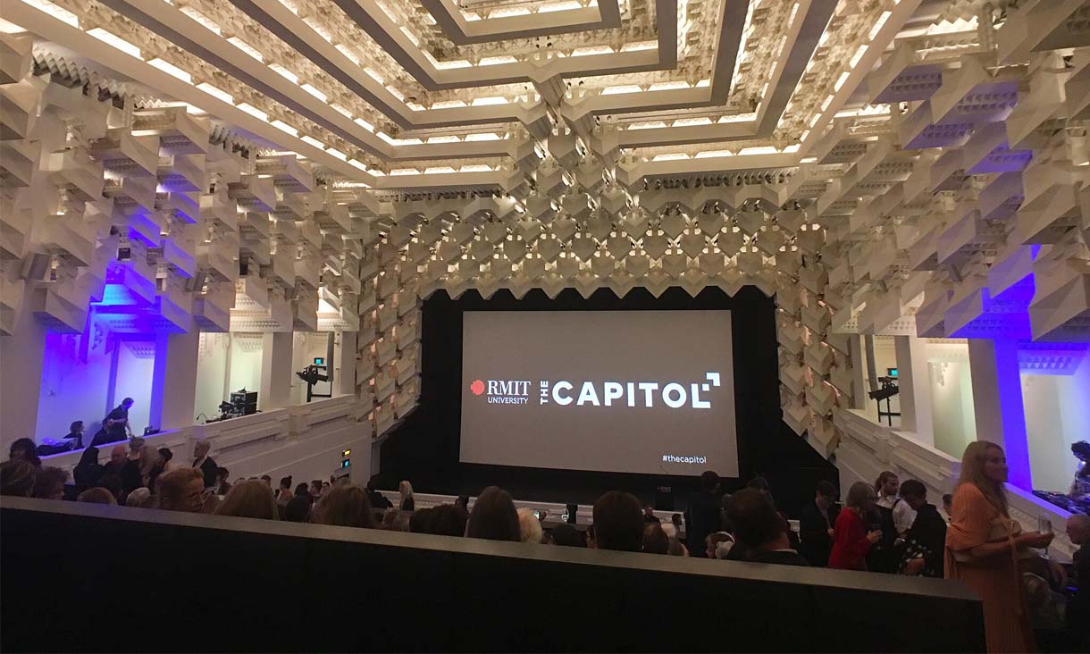 A photo of the lecture hall at the Melbourne Capitol Theatre filled with people.