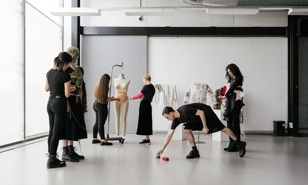 A group of RMIT fashion students work together to design a new collection. 