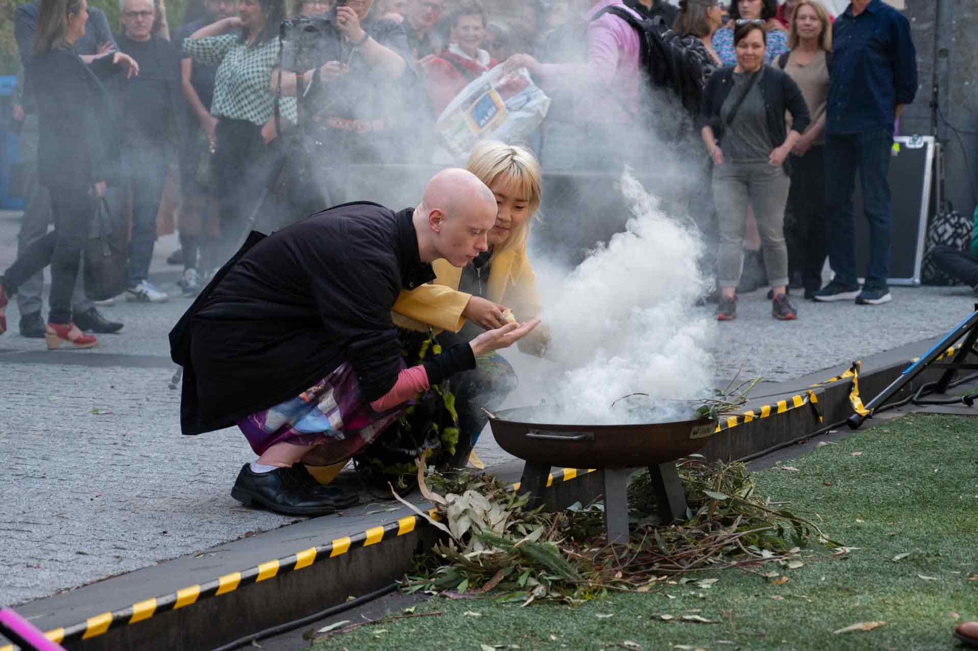 smoking ceremony during opening of ‘Graduate Exhibition: Photography, Fine Art Honours, MFA, & Art in Public Space’, 6 December 2022, RMIT City Campus. Photo: Leni Ciuro