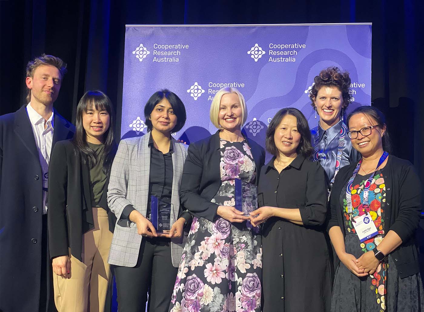 Alessandro Luongo (DHCRC), Hui Mathews (DHCRC), Dr Tabinda Sarwar (RMIT), Vickie Irving (Telstra Health), Dr Jocelyn Ling (DHCRC), Dr Clare Morgan (DHCRC), Judith Ngai (DHCRC) at the Cooperative Research Australia awards in Brisbane.