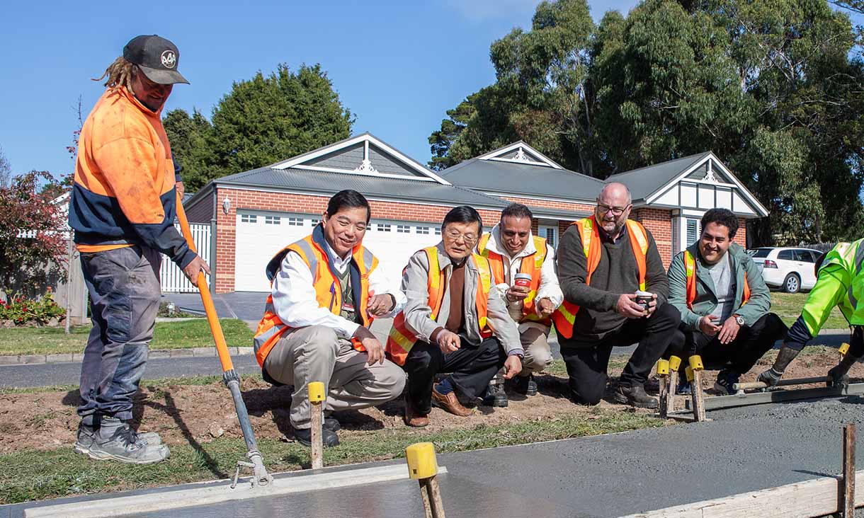 Council officers and the RMIT research team were present for the pour of the coffee concrete for the footpath trial in Gisborne. Credit: Carelle Mulawa-Richards, RMIT University