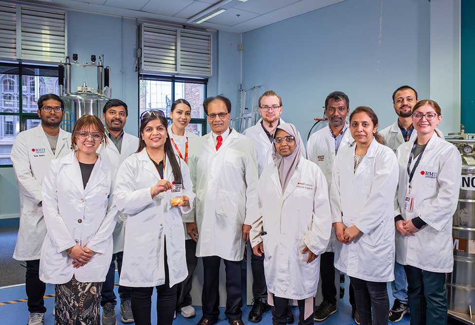 The gold anticancer drug research team from RMIT's Centre for Advanced Materials and Industrial Chemistry, with Dr Ruchicka Ojha holding gold donated by Pallion subsidiary ABC Bullion. 