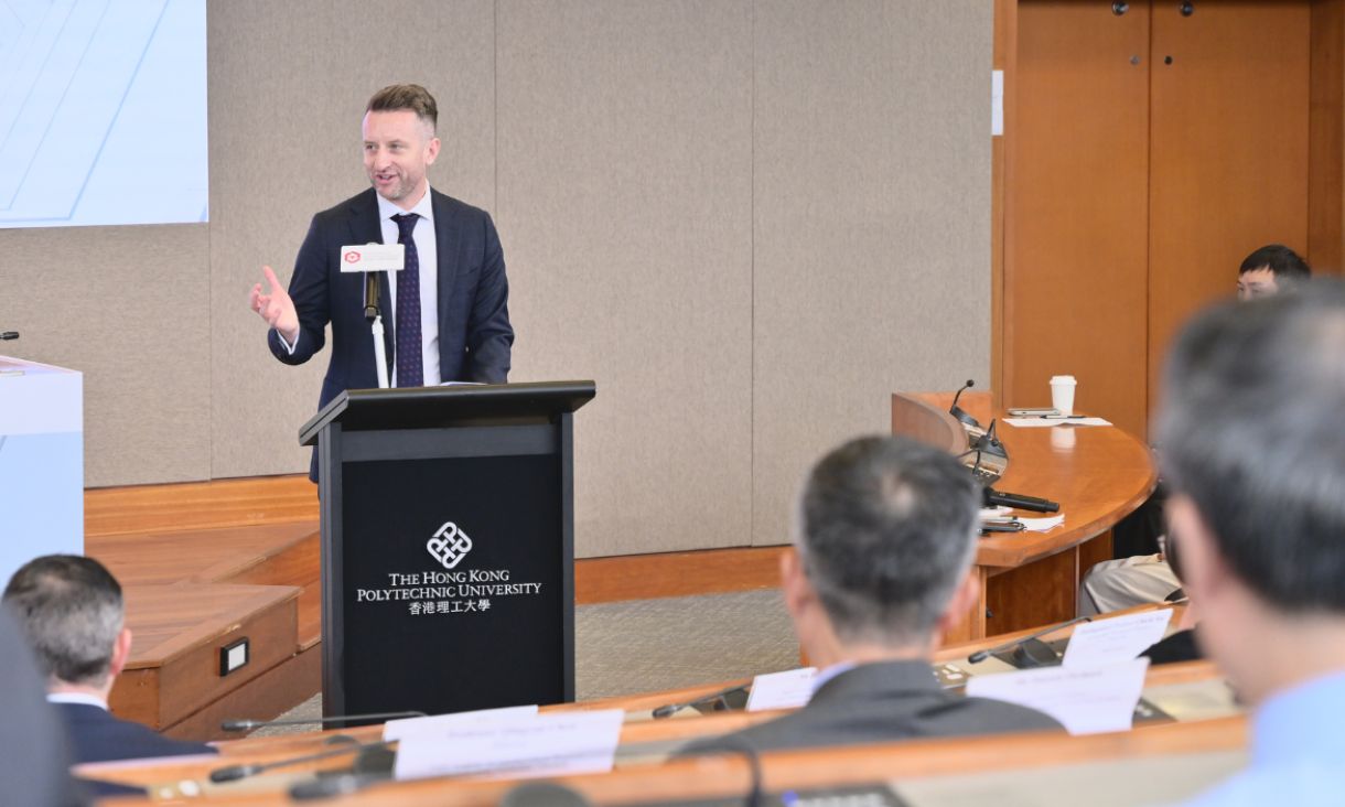 Man giving speech at lectern